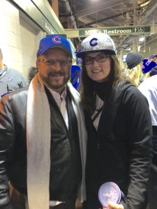 Wayne Messmer '72 and Kate Tock '14 before game 5 of the World Series at Wrigley Field