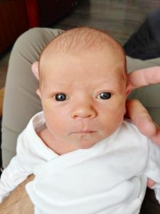 picture of baby with wide dark eyes