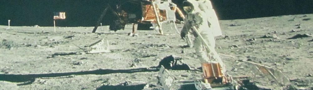 astronaut with lunar test equipment