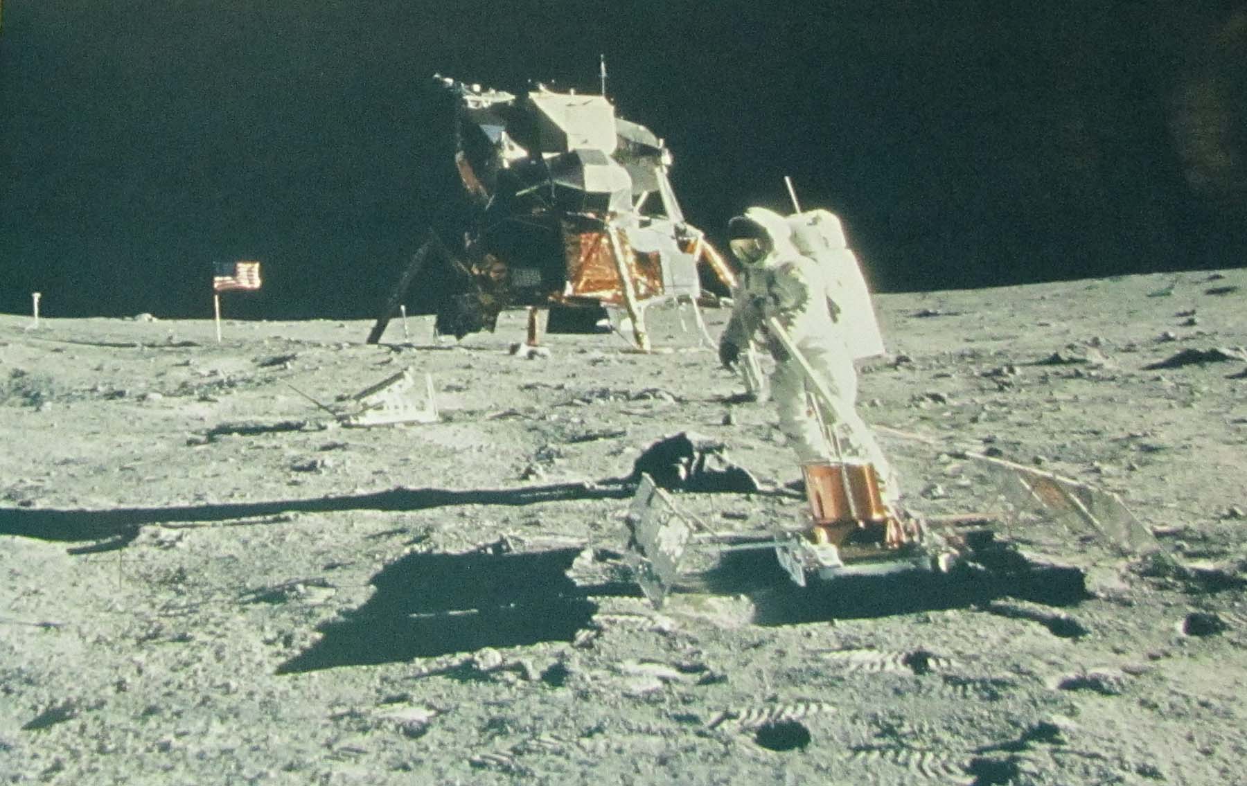 astronaut with lunar test equipment