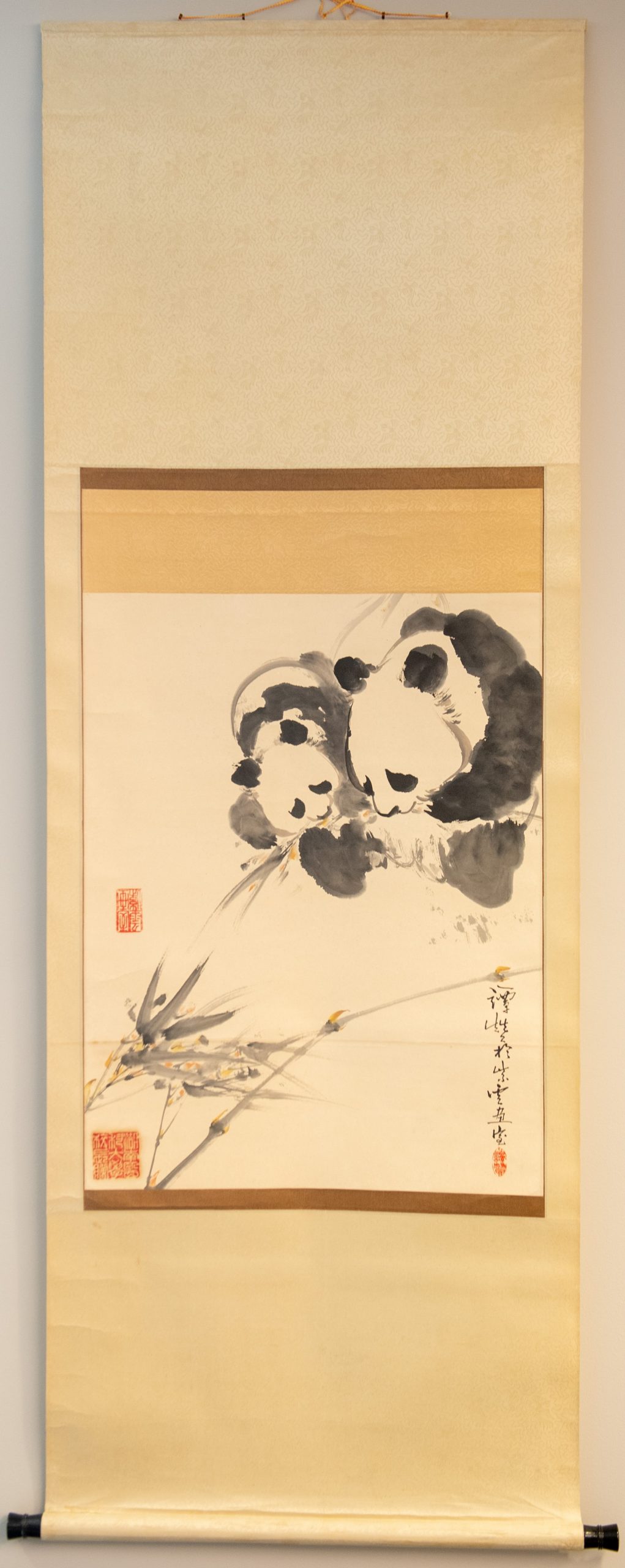 two Pandas scroll